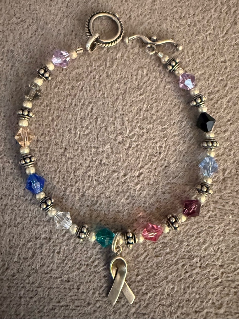 Beautiful Sterling Silver Cancer Awareness Bracelet with Ribbon Charm
